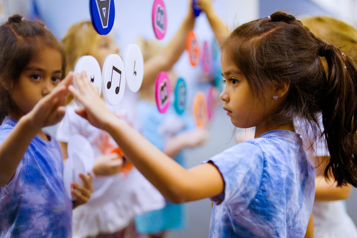 a girl concentrating on music theory